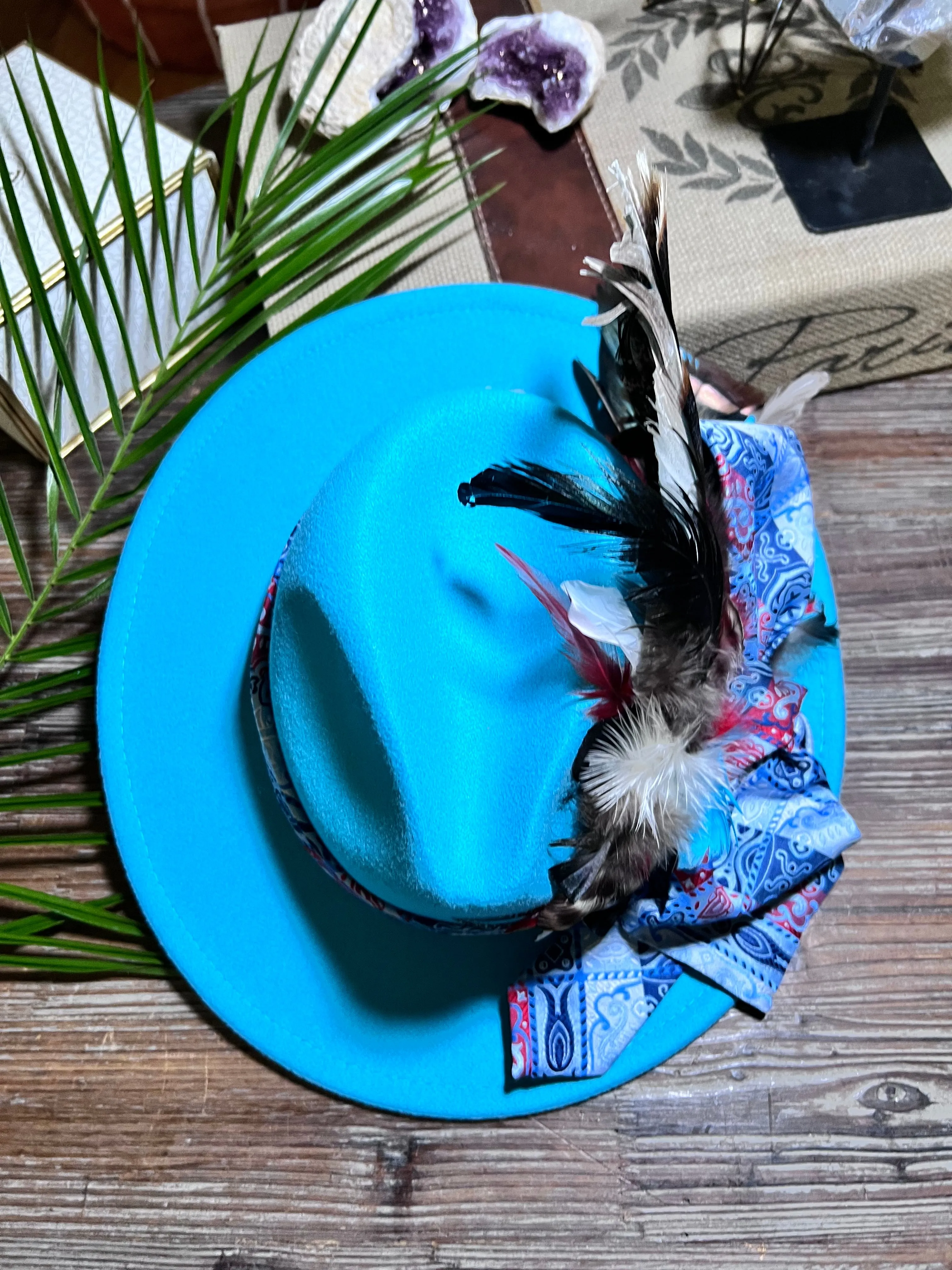 The Turquoise Feathered Hat